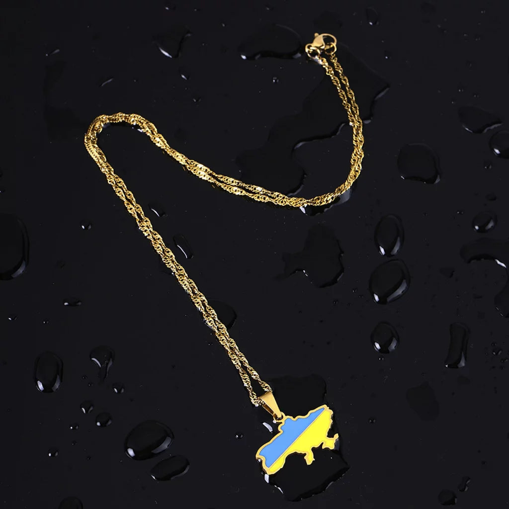 Ukrainian Solidarity Symbol Map Pendant Necklace shown covered in water to highlight the material's resistance to tarnishing from water exposure.