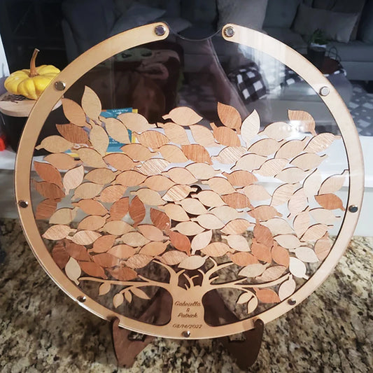 Wooden decorative item with leaf pattern on a stand