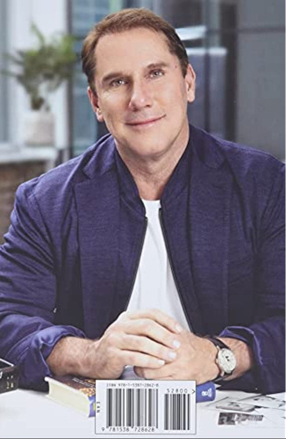 Book back cover of "The Wish" by Nicholas Sparks featuring the author portrait and barcode with ISBN: 9781538728628 at the bottom center of the cover.