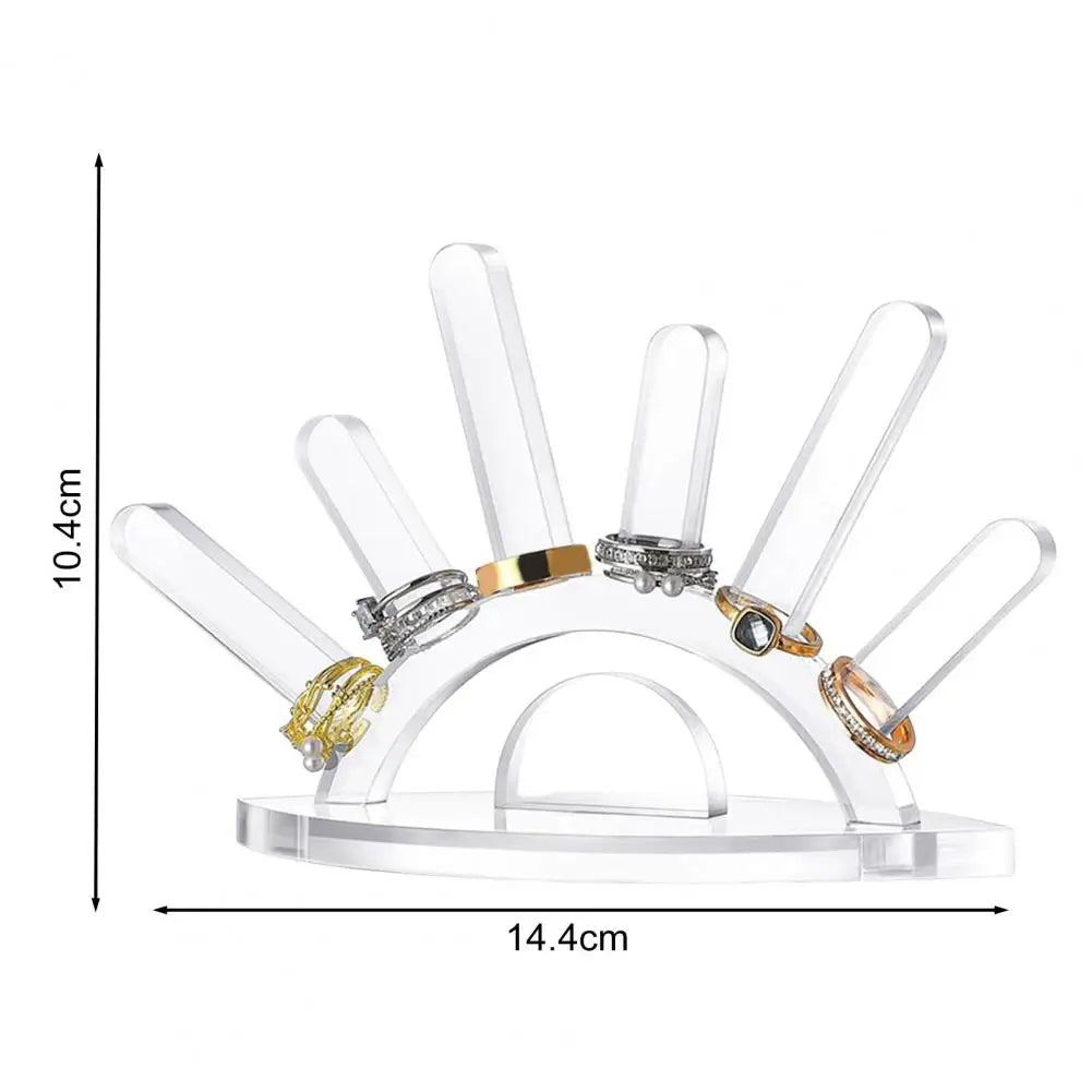 Clear acrylic ring display stand with dimensions on a white background