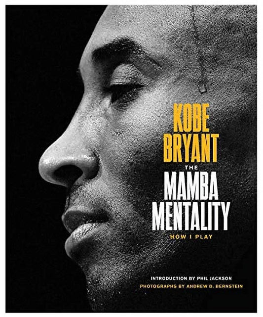 Cover of the book 'The Mamba Mentality: How I Play' by Kobe Bryant featuring a close-up photograph of Kobe Bryant's face with a subtle gradient background.