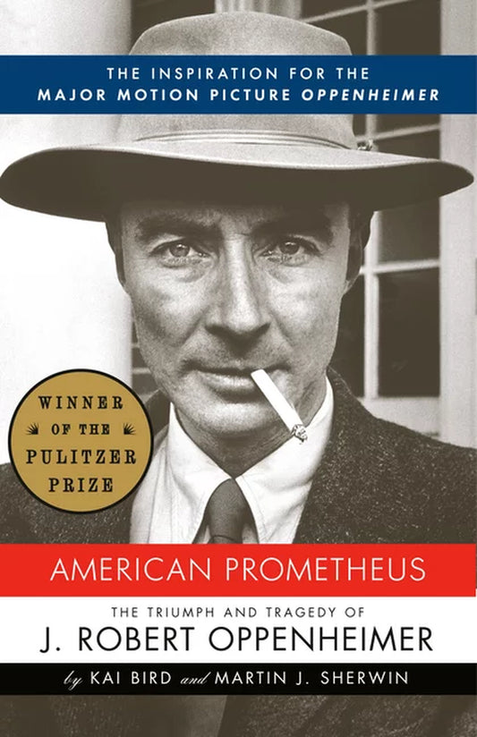 Book cover of 'American Prometheus [The Inspiration for the Major Motion Picture Oppenheimer]: The Triumph and Tragedy of J. Robert Oppenheimer (ISBN: 9780375726262)' featuring a black and white photo of Oppenheimer with the Pulitzer Prize label, and authors' names Kai Bird and Martin Sherwin.
