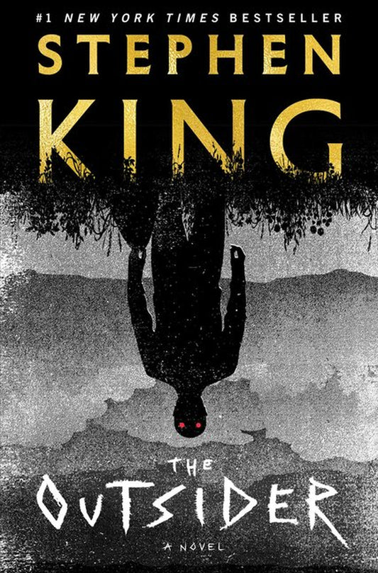 The image displays the cover of "The Outsider" by Stephen King, which features a dark and atmospheric design. The background is a moody mix of trees and a night sky, emphasizing the novel's suspenseful and dark themes.