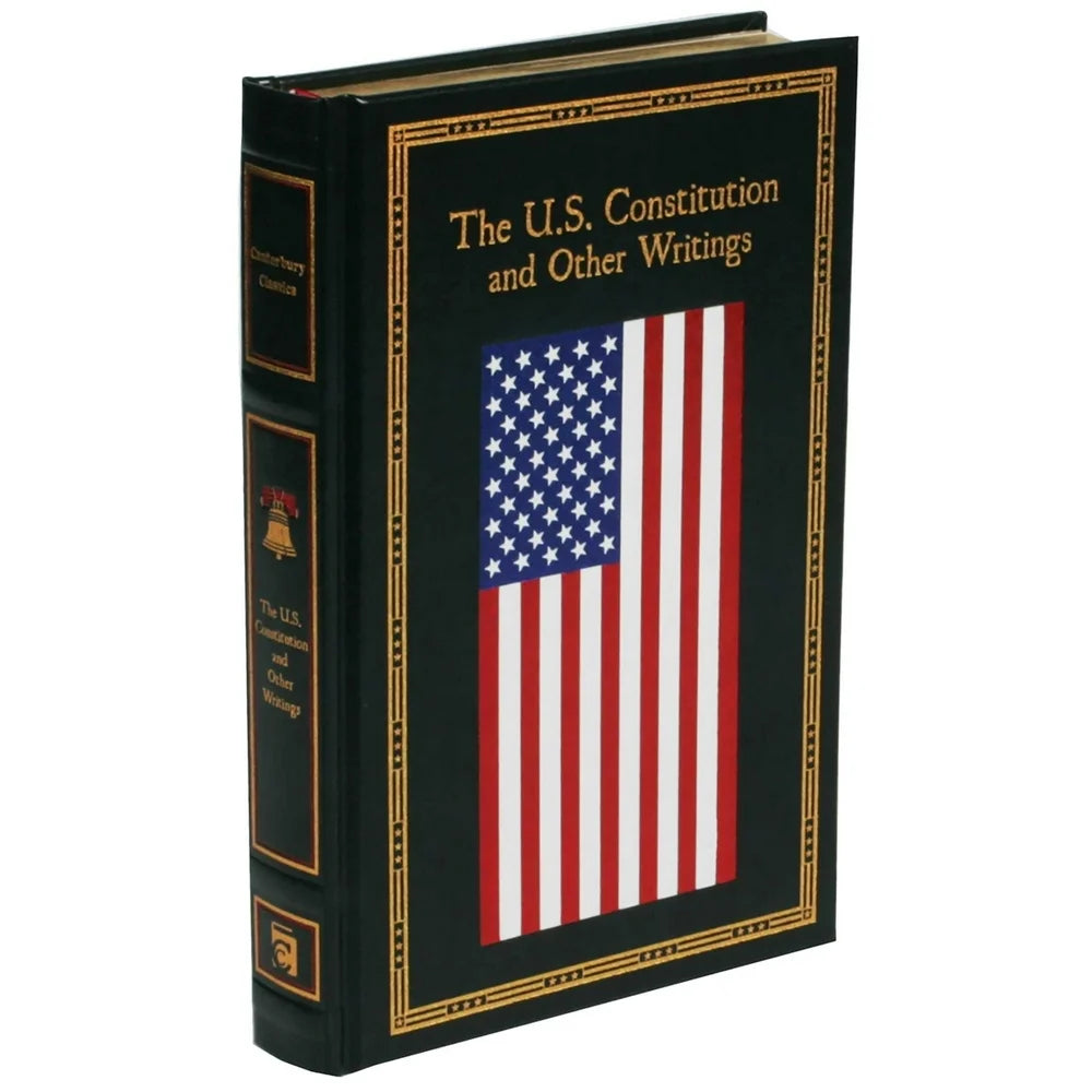 Angled view of the leather‑bound front cover of “The U.S. Constitution and Other Writings,” published by Canterbury Classics. The cover features embossed decorative borders and a classic navy‑and‑gold design highlighting the title. Leather edition edited by the Editors of Thunder Bay Press, ISBN‑13 9781684120987.
