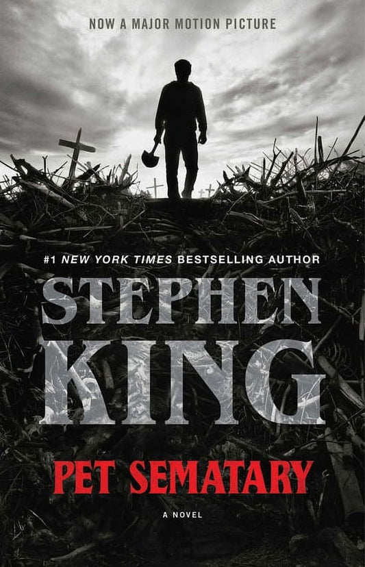 Cover of the novel 'Pet Sematary' by Stephen King, depicting a dark, eerie scene with a figure in the foreground, surrounded by a desolate, ruined landscape.