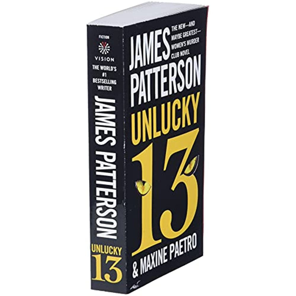 Angled view of the front book cover of the novel 'Unlucky 13' by James Patterson & Maxine Paetro features a bold design with the title prominently displayed in large, yellow numerals. In the background, there is a silhouette of a bird, possibly a red-tailed hawk, which adds an element of mystery and thriller.